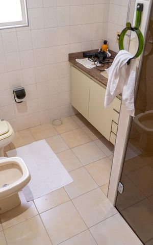 Casa para alugar com 412m², 4 quartos e 6 vagasBanheiro da Suíte 3