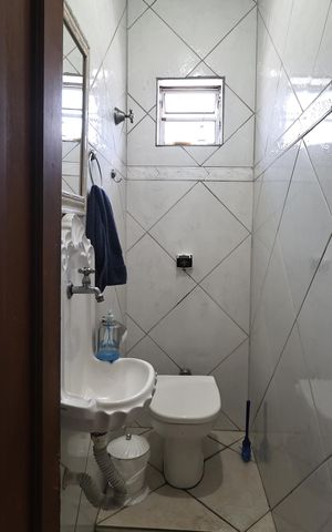 Casa à venda com 231m², 3 quartos e 2 vagasLavabo
