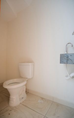 Casa à venda com 134m², 3 quartos e 3 vagasLavabo da Garagem