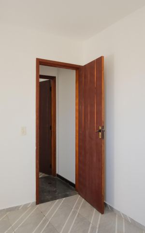 Casa de condomínio à venda com 58m², 2 quartos e 1 vagaSuíte 1