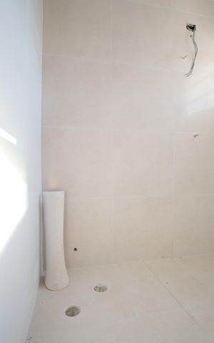 Casa de condomínio à venda com 58m², 2 quartos e 1 vagaBanheiro da Suíte 2
