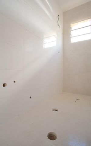 Casa de condomínio à venda com 58m², 2 quartos e 1 vagaBanheiro da Suíte 1