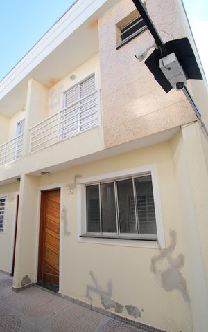 Casa de condomínio à venda com 58m², 2 quartos e 1 vagaFachada