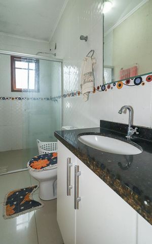Casa à venda com 238m², 4 quartos e 3 vagasBanheiro Social