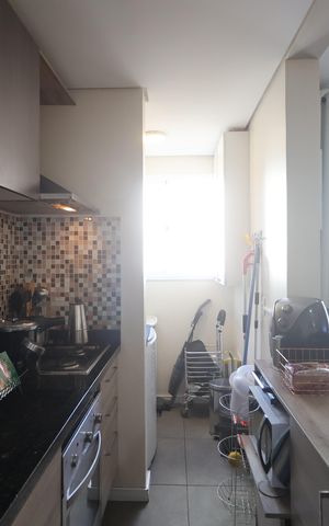 Apartamento à venda com 58m², 2 quartos e 1 vagaCozinha e Área de Serviço