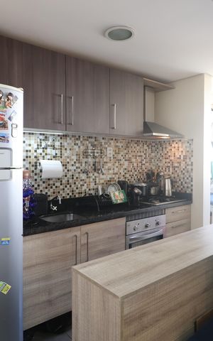 Apartamento à venda com 58m², 2 quartos e 1 vagaCozinha e Área de Serviço