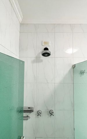 Casa à venda com 465m², 4 quartos e 7 vagas Casa à venda com 465m², 4 quartos e 7 vagasBanheiro da Suíte 3