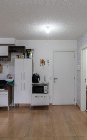 Casa de condomínio à venda com 37m², 2 quartos e sem vaga Casa de condomínio à venda com 37m², 2 quartos e sem vagaSala e Cozinha