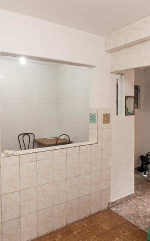 Casa à venda com 450m², 3 quartos e 2 vagasCasa 1 - Cozinha e Área de Serviço