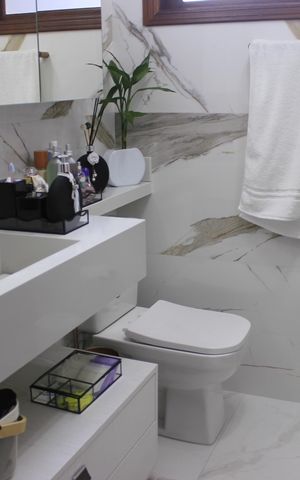 Casa de condomínio à venda com 166m², 3 quartos e 3 vagasBanheiro da Suíte 1