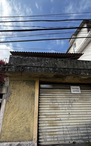 Casa à venda com 327m², 2 quartos e 1 vagaFachada/Placa