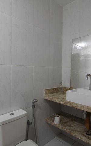 Casa de condomínio à venda com 180m², 3 quartos e 1 vagaBanheiro Social
