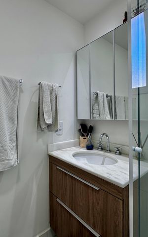 Apartamento à venda com 83m², 2 quartos e 2 vagas Apartamento à venda com 83m², 2 quartos e 2 vagasBanheiro Suíte 1