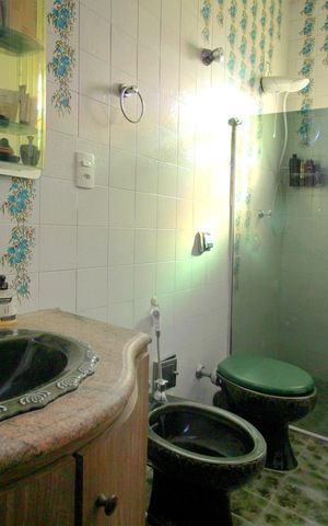 Casa à venda com 273m², 3 quartos e 4 vagasBanheiro da Suíte