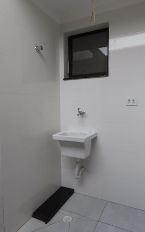 Casa de condomínio à venda com 84m², 2 quartos e 1 vagaLavanderia