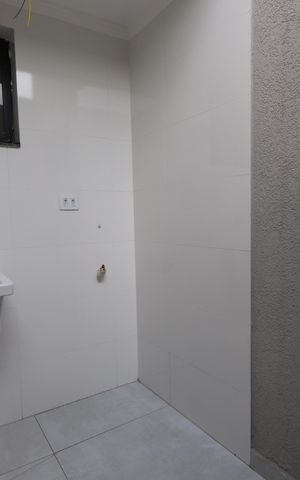 Casa de condomínio à venda com 84m², 2 quartos e 1 vagaLavanderia
