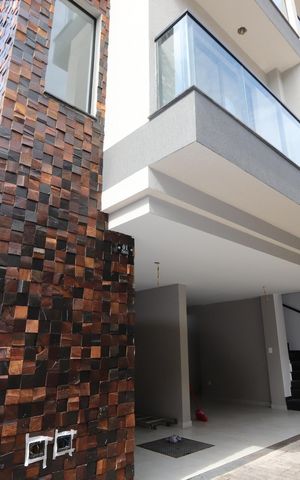 Casa de condomínio à venda com 84m², 2 quartos e 1 vagaFachada da casa