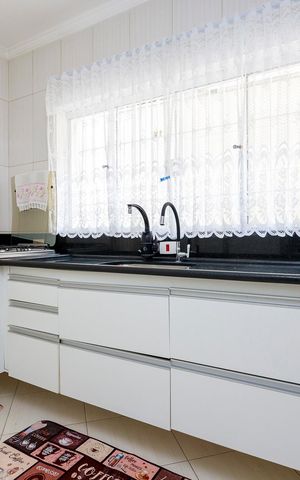 Casa à venda com 150m², 3 quartos e 2 vagas Casa à venda com 150m², 3 quartos e 2 vagasCozinha
