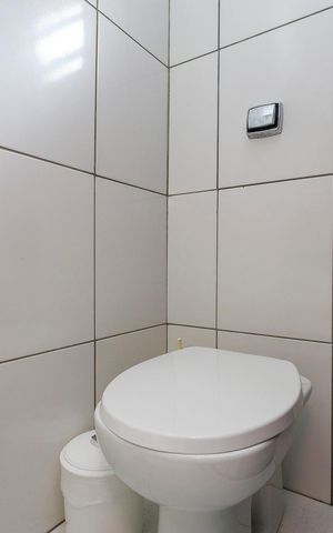 Casa à venda com 150m², 3 quartos e 2 vagas Casa à venda com 150m², 3 quartos e 2 vagasBanheiro 2