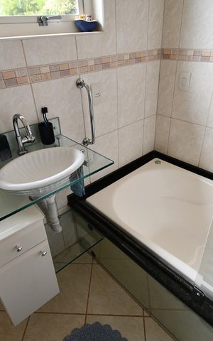 Casa à venda com 292m², 4 quartos e 1 vagaBanheiro da Suíte 2