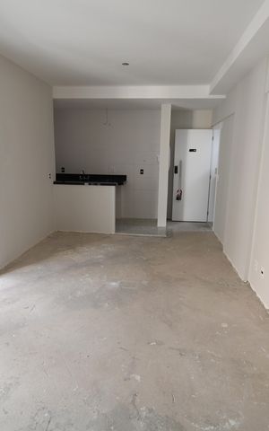 Apartamento à venda com 52m², 1 quarto e 2 vagasSala