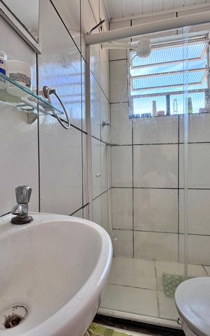 Casa à venda com 110m², 3 quartos e 1 vaga Casa à venda com 110m², 3 quartos e 1 vagaSuite 1 - Banheiro