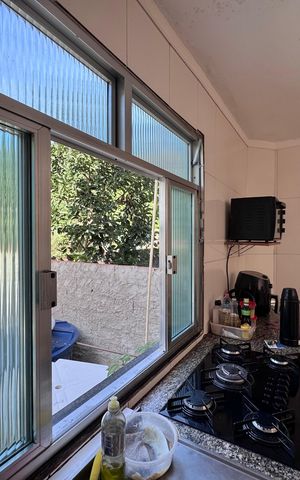 Casa à venda com 110m², 3 quartos e 1 vaga Casa à venda com 110m², 3 quartos e 1 vagaCozinha e Área de Serviço