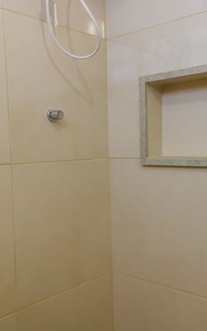 Casa à venda com 341m², 4 quartos e 4 vagas Casa à venda com 341m², 4 quartos e 4 vagasBanheiro da Suite