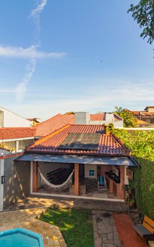 Casa à venda com 250m², 4 quartos e 2 vagas Casa à venda com 250m², 4 quartos e 2 vagasVista da Varanda do Quarto