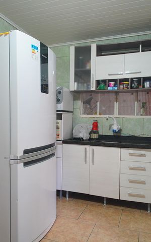 Casa à venda com 90m², 3 quartos e 2 vagasCozinha