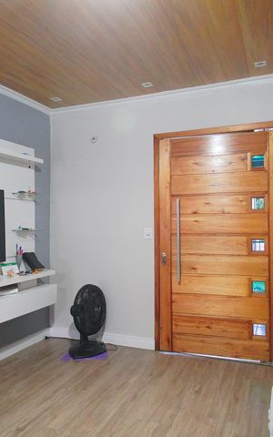 Casa à venda com 90m², 3 quartos e 2 vagasSala