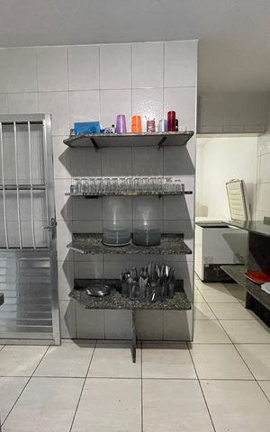 Casa à venda com 330m², 3 quartos e 7 vagas Casa à venda com 330m², 3 quartos e 7 vagasCozinha salão de festas
