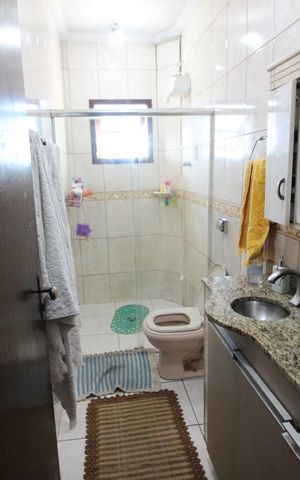 Casa à venda com 356m², 3 quartos e 2 vagasBanheiro da Suíte 1