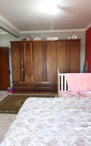 Casa à venda com 356m², 3 quartos e 2 vagasSuíte 1
