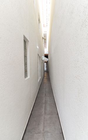 Casa à venda com 131m², 3 quartos e 2 vagas Casa à venda com 131m², 3 quartos e 2 vagasCorredor Externo