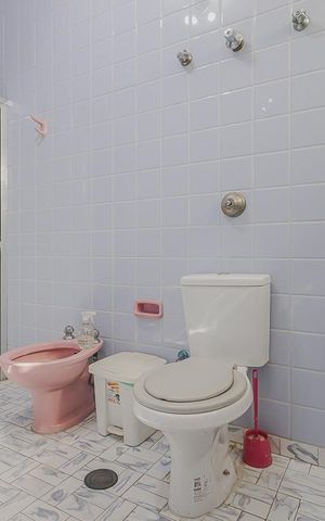 Casa à venda com 354m², 3 quartos e 8 vagasBanheiro