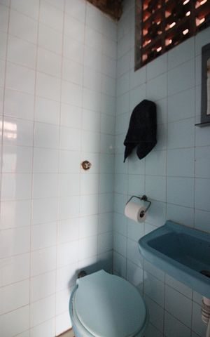 Casa à venda com 239m², 3 quartos e 4 vagasBanheiro de Serviço
