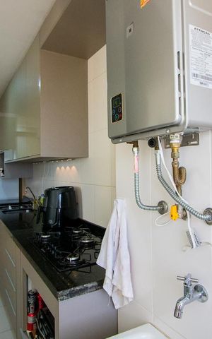 Apartamento à venda com 68m², 2 quartos e 1 vaga Apartamento à venda com 68m², 2 quartos e 1 vagaCozinha e Área de Serviço