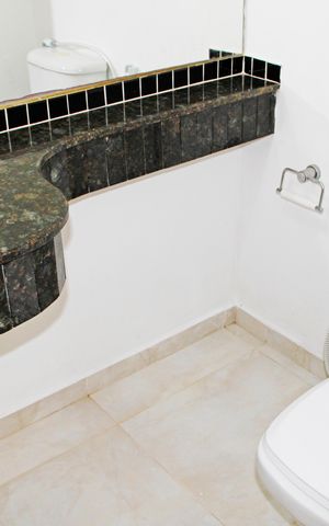 Casa de condomínio para alugar com 300m², 4 quartos e 2 vagasBanheiro da Suíte 1