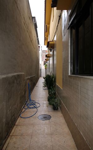 Casa à venda com 69m², 2 quartos e sem vagaCorredor de acesso