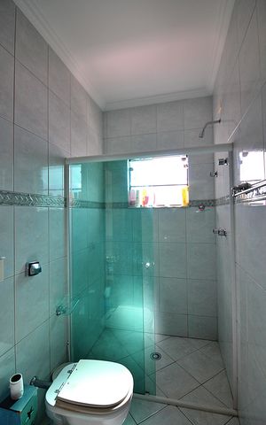 Casa à venda com 600m², 4 quartos e 6 vagasSuíte 2 Banheiro