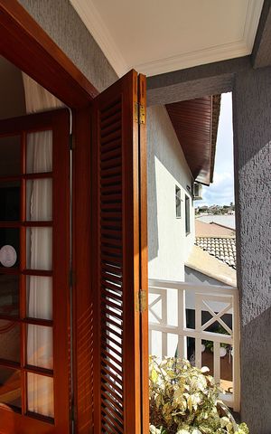Casa à venda com 600m², 4 quartos e 6 vagasSuíte 2 Sacada
