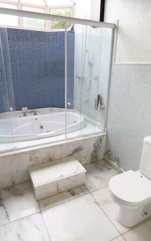 Casa de condomínio à venda com 470m², 4 quartos e 2 vagasBanheiro 2 - Suíte