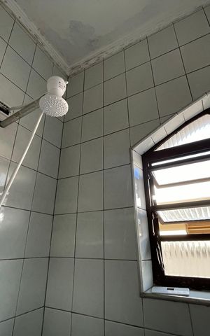 Casa à venda com 200m², 3 quartos e 2 vagas Casa à venda com 200m², 3 quartos e 2 vagasBanheiro 1