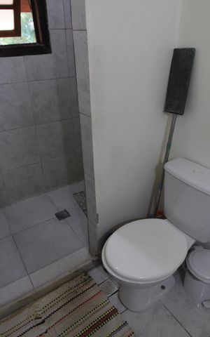 Casa de condomínio à venda com 374m², 4 quartos e 2 vagasCasa 1: Banheiro Social