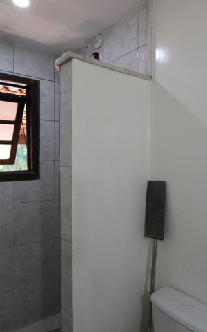 Casa de condomínio à venda com 374m², 4 quartos e 2 vagasCasa 1: Banheiro Social