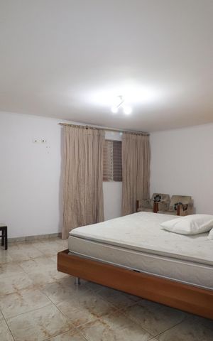 Casa à venda com 348m², 3 quartos e 12 vagasCasa 1 - Quarto 1 suíte