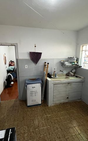Casa à venda com 400m², 3 quartos e 2 vagasCasa 2 - Sala/Cozinha 