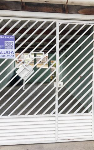 Casa para alugar com 120m², 2 quartos e 1 vagaFachada + Plaquinha