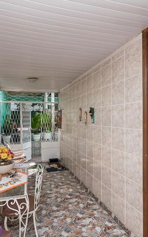 Casa à venda com 400m², 6 quartos e 2 vagas Casa à venda com 400m², 6 quartos e 2 vagasCasa 1 - Varanda da Sala